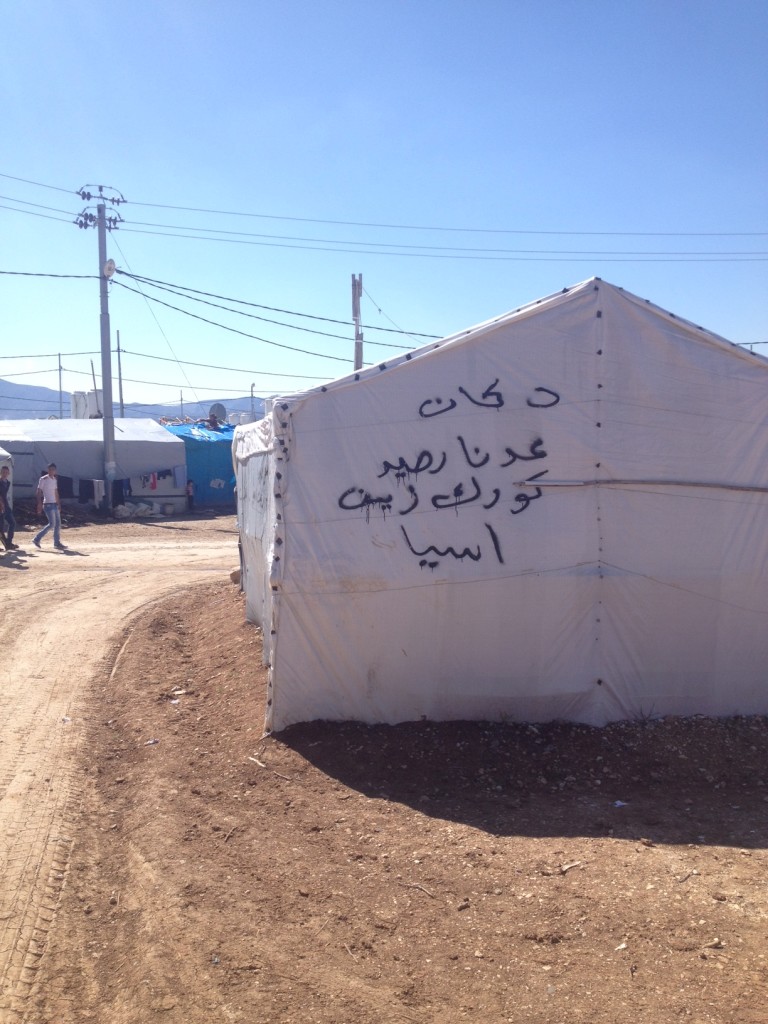 Writing on this tent in Dawodiya IDP camp, advertises that they sell credit for Korek, Zain and Asiacell, the three mobile network operators in Iraq. 